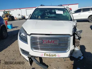 2013 GMC Acadia Denali with VIN 1GKKVTKD1DJ269656, listed as a IAAI auction lot 40638533 with 128,698 mi miles. Bid and sale history available at carsss.com. Image 12.