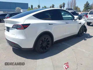 2023 Tesla Model Y Long Range with VIN 7SAYGDEE8PF612438, listed as a IAAI auction lot 41991145 with 29,775 mi miles and . Bid and sale history available at carsss.com. Image 4.