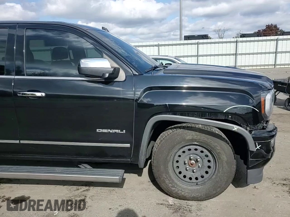2018 GMC Sierra 1500 Denali z VIN 3GTU2PEJ3JG523077, wystawiony jako Copart lot #72094704 z przebiegiem 117 756 mil mil oraz Szkoda całkowita • Salvage title. Historia ofert i sprzedaży dostępna na DreamBid. Obrazek 11.