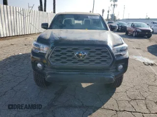 2022 Toyota Tacoma SR with VIN 3TMCZ5AN0NM475548, listed as a Copart auction lot 42057405 with 56,008 mi miles and Salvage title. Bid and sale history available at DreamBid. Image 5.