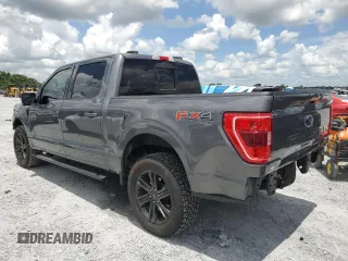 2021 Ford F-150 XL with VIN 1FTFW1E87MFC00633, listed as a Copart auction lot 65318235 with 91,264 mi miles and Salvage title. Bid and sale history available at DreamBid. Image 2.