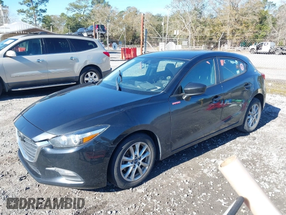 2017 Mazda 3 Sport with VIN 3MZBN1K72HM101671, listed as a IAAI auction lot 41325369 with 97,520 mi miles. Bid and sale history available at carsss.com. Image 2.