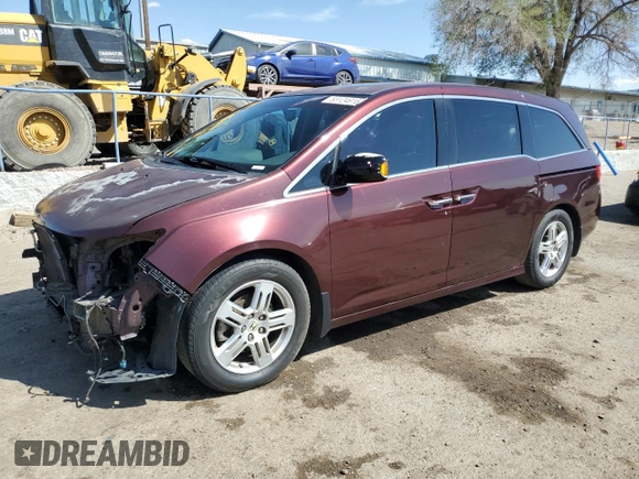 2012 Honda Odyssey Touring with VIN 5FNRL5H90CB076810, listed as a Copart auction lot 53124915 with 178,316 mi miles and Salvage Title. Bid and sale history available at DreamBid. Image 1.