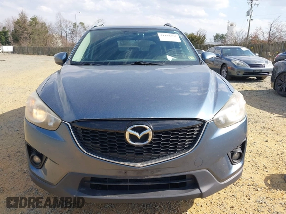 2015 Mazda CX-5 Grand Touring with VIN JM3KE4DY5F0469098, listed as a IAAI auction lot 41858792 with 174,883 mi miles. Bid and sale history available at carsss.com. Image 13.