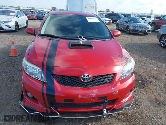 2009 Toyota Corolla with VIN 1NXBU40EX9Z027482, listed as a IAAI auction lot 42149978 with 164,318 mi miles. Bid and sale history available at carsss.com. Image 12.