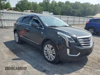 2019 Cadillac XT5 Premium Luxury AWD with VIN 1GYKNFRS9KZ223065, listed as a Copart auction lot 60902645 with 101,168 mi miles and Salvage title. Bid and sale history available at DreamBid. Image 4.