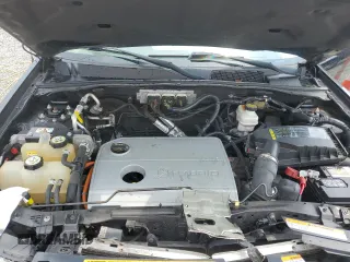 2010 Ford Escape Hybrid with VIN 1FMCU4K32AKB40357, listed as a Copart auction lot 59500025 with 169,955 mi miles and Salvage title. Bid and sale history available at DreamBid. Image 11.