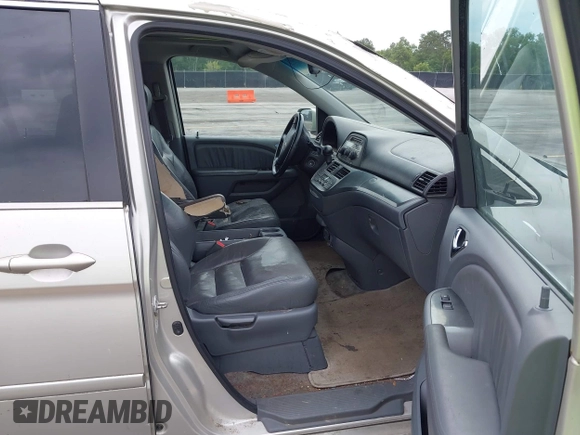 2007 Honda Odyssey EX-L z VIN 5FNRL38647B426620, wystawiony jako IAAI lot #42059093 z przebiegiem 258 622 mil mil oraz . Historia ofert i sprzedaży dostępna na DreamBid. Obrazek 5.