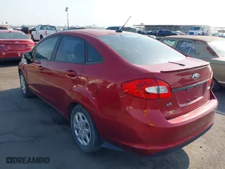 2013 Ford Fiesta SE with VIN 3FADP4BJ8DM194652, listed as a IAAI auction lot 39677371 with 74,261 mi miles. Bid and sale history available at carsss.com. Image 3.