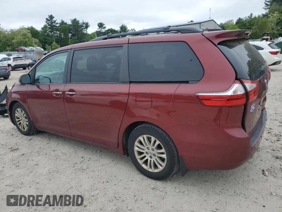 2015 Toyota Sienna XLE with VIN 5TDYK3DC1FS648469, listed as a Copart auction lot 57471975 with 118,567 mi miles and Non repairable. Bid and sale history available at DreamBid. Image 2.