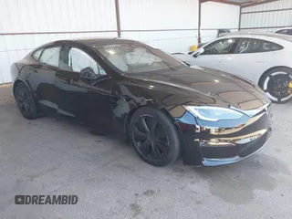 2023 Tesla Model S with VIN 5YJSA1E59PF499778, listed as a IAAI auction lot 40454608 with Not provided miles and . Bid and sale history available at DreamBid. Image 1.