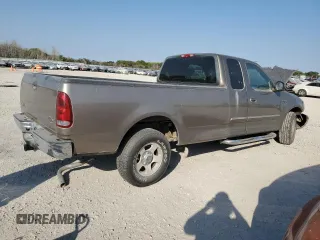 2002 Ford F-150 XL with VIN 1FTRX17L22NA48307, listed as a Copart auction lot 74238074 with 80,010 mi miles and Salvage title. Bid and sale history available at DreamBid. Image 3.