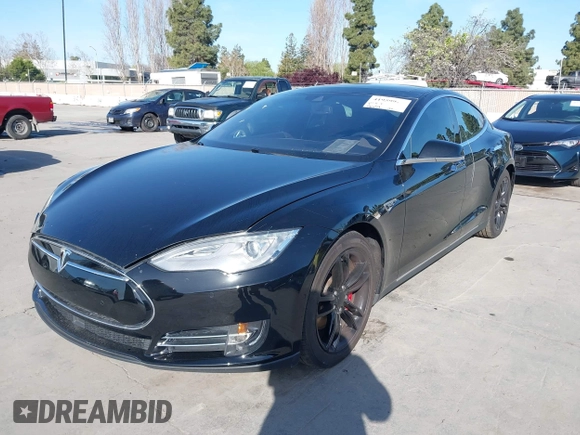 2014 Tesla Model S P85D with VIN 5YJSA1H22EFP65530, listed as a IAAI auction lot 41959941 with 76,532 mi miles and . Bid and sale history available at DreamBid. Image 6.