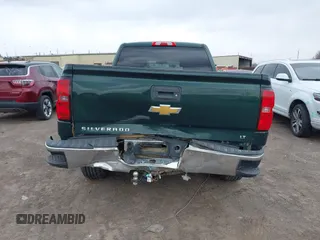 2015 Chevrolet Silverado 1500 LT with VIN 1GCVKREC1FZ342326, listed as a IAAI auction lot 41968095 with 119,911 mi miles and . Bid and sale history available at DreamBid. Image 16.