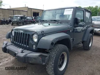 2017 Jeep Wrangler Sport z VIN 1C4AJWAG0HL754381, wystawiony jako IAAI lot #42366858 z przebiegiem 35 760 mil mil oraz . Historia ofert i sprzedaży dostępna na DreamBid. Obrazek 6.