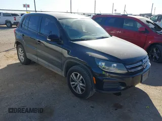 2013 Volkswagen Tiguan S z VIN WVGAV3AXXDW594680, wystawiony jako IAAI lot #41652323 z przebiegiem 136 382 mil mil oraz . Historia ofert i sprzedaży dostępna na DreamBid. Obrazek 1.