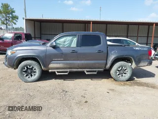 2016 Toyota Tacoma SR with VIN 5TFCZ5AN5GX010227, listed as a IAAI auction lot 41792719 with 228,070 mi miles. Bid and sale history available at carsss.com. Image 13.