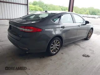 2017 Ford Fusion SE z VIN 3FA6P0HD2HR270782, wystawiony jako IAAI lot #42310190 z przebiegiem 107 133 mil mil oraz . Historia ofert i sprzedaży dostępna na DreamBid. Obrazek 4.