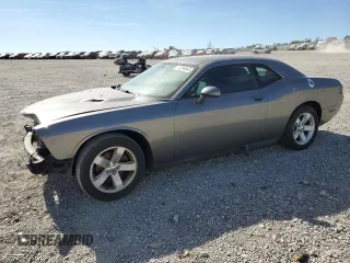 2011 Dodge Challenger z VIN 2B3CJ4DG9BH570202, wystawiony jako Copart lot #73284844 z przebiegiem 217 850 mil mil oraz Szkoda całkowita • Salvage title. Historia ofert i sprzedaży dostępna na DreamBid. Obrazek 1.