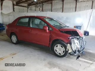 2011 Nissan Versa S with VIN 3N1BC1AP7BL468978, listed as a Copart auction lot 51956355 with 131,307 mi miles and Salvage title. Bid and sale history available at DreamBid. Image 4.