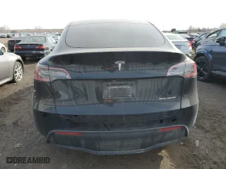 2024 Tesla Model Y Long Range with VIN 7SAYGDEE0RF034080, listed as a Copart auction lot 48329125 with 33,448 mi miles and Salvage Title. Bid and sale history available at carsss.com. Image 6.