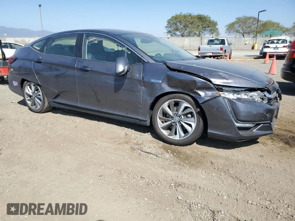 2019 Honda Clarity Plug-In Hybrid Touring with VIN JHMZC5F31KC003180, listed as a Copart auction lot 56952284 with 57,249 mi miles and Salvage Title. Bid and sale history available at carsss.com. Image 4.
