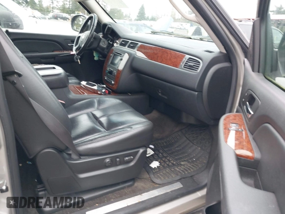 2007 Chevrolet Tahoe LTZ with VIN 1GNFK13047J373205, listed as a IAAI auction lot 41830747 with 182,361 mi miles and . Bid and sale history available at DreamBid. Image 5.