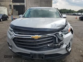 2021 Chevrolet Traverse LT Cloth with VIN 1GNERGKW1MJ103022, listed as a Copart auction lot 64139944 with 74,275 mi miles and Salvage Title. Bid and sale history available at carsss.com. Image 5.