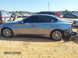 2015 Infiniti Q50 Premium with VIN JN1BV7AP2FM336977, listed as a IAAI auction lot 41782699 with 103,031 mi miles. Bid and sale history available at carsss.com. Image 15.