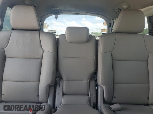 2014 Honda Odyssey EX-L with VIN 5FNRL5H62EB112280, listed as a Copart auction lot 60138645 with 167,657 mi miles and Salvage title. Bid and sale history available at DreamBid. Image 10.