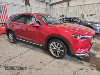 2016 Mazda CX-9 Grand Touring with VIN JM3TCBDY0G0109463, listed as a Copart auction lot 65252425 with 127,874 mi miles and Clean title. Bid and sale history available at DreamBid. Image 4.