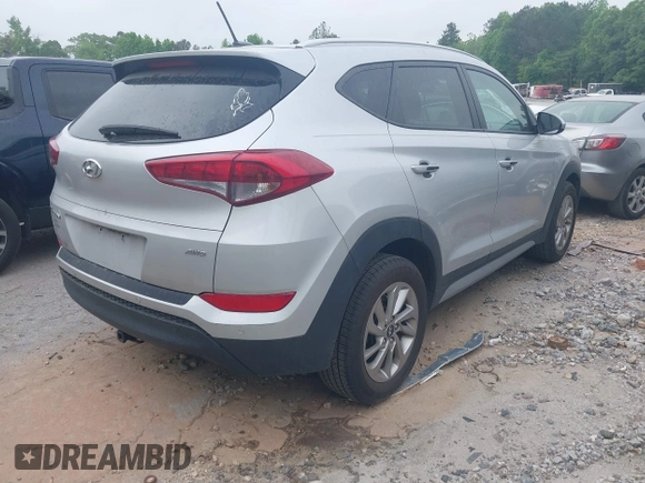 2017 Hyundai Tucson SE with VIN KM8J3CA44HU585714, listed as a IAAI auction lot 42097980 with 96,483 mi miles. Bid and sale history available at carsss.com. Image 4.