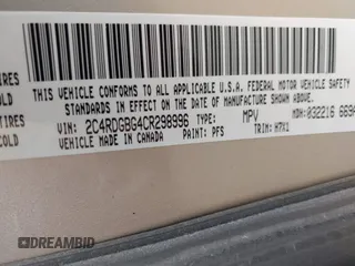 2012 Dodge Grand Caravan SE with VIN 2C4RDGBG4CR298996, listed as a IAAI auction lot 42133423 with 70,354 mi miles and . Bid and sale history available at DreamBid. Image 9.