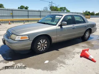 2003 Ford Crown Victoria LX z VIN 2FAFP74W43X123583, wystawiony jako Copart lot #57677555 z przebiegiem 185 336 mil mil oraz Szkoda całkowita • Salvage title. Historia ofert i sprzedaży dostępna na DreamBid. Obrazek 1.