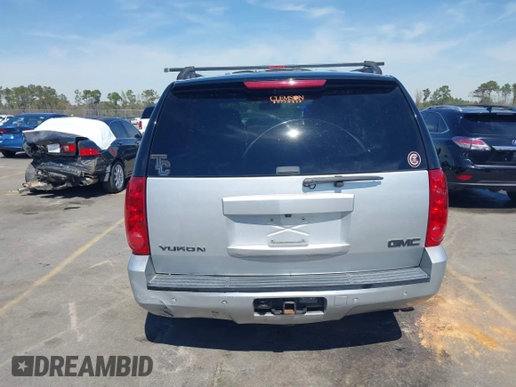 2014 GMC Yukon SLT with VIN 1GKS1CE04ER121301, listed as a IAAI auction lot 41825056 with 141,562 mi miles. Bid and sale history available at carsss.com. Image 17.