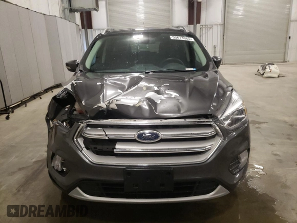 2019 Ford Escape Titanium z VIN 1FMCU9J93KUC54523, wystawiony jako Copart lot #53613665 z przebiegiem 140 895 mil mil oraz Szkoda całkowita • Salvage title. Historia ofert i sprzedaży dostępna na DreamBid. Obrazek 5.
