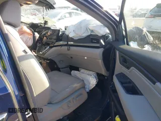 2024 Honda Odyssey EX-L with VIN 5FNRL6H60RB061017, listed as a IAAI auction lot 41399491 with 6,921 mi miles and . Bid and sale history available at DreamBid. Image 5.