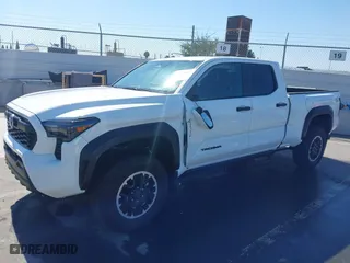 2024 Toyota Tacoma 4WD SR5 with VIN 3TMLB5JN1RM050446, listed as a IAAI auction lot 41658922 with 9,369 mi miles. Bid and sale history available at carsss.com. Image 2.