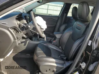 2022 Jeep Cherokee Trailhawk with VIN 1C4PJMBX8ND554044, listed as a Copart auction lot 82687464 with 13,353 mi miles and Salvage Title. Bid and sale history available at carsss.com. Image 7.