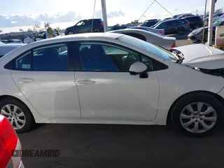 2022 Toyota Corolla LE with VIN 5YFEPMAE3NP276964, listed as a IAAI auction lot 41714701 with 63,597 mi miles. Bid and sale history available at carsss.com. Image 13.