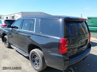 2019 Chevrolet Tahoe Commercial with VIN 1GNLCDECXKR133529, listed as a IAAI auction lot 41890263 with 160,227 mi miles. Bid and sale history available at carsss.com. Image 3.