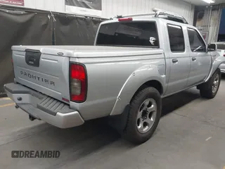 2001 Nissan Frontier z VIN 1N6MD27T01C384859, wystawiony jako IAAI lot #42058030 z przebiegiem 90 415 mil mil oraz . Historia ofert i sprzedaży dostępna na DreamBid. Obrazek 4.