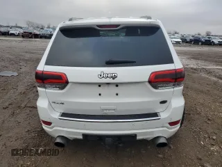 2014 Jeep Grand Cherokee Overland with VIN 1C4RJFCG7EC572298, listed as a Copart auction lot 83970004 with 104,861 mi miles and Salvage Title. Bid and sale history available at DreamBid. Image 6.