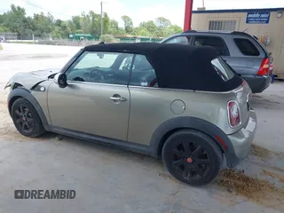 2010 MINI Convertible with VIN WMWMR3C52ATU97825, listed as a IAAI auction lot 42349417 with 64,045 mi miles and . Bid and sale history available at DreamBid. Image 14.