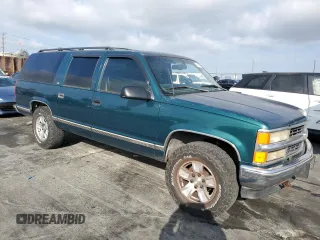 1997 Chevrolet Suburban with VIN 3GNFK16R4VG163602, listed as a Copart auction lot 76081984 with 243,169 mi miles and Salvage Title. Bid and sale history available at carsss.com. Image 4.