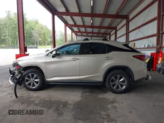 2019 Lexus RX 350 with VIN JTJBZMCA2K2039042, listed as a IAAI auction lot 42469481 with 84,794 mi miles and . Bid and sale history available at DreamBid. Image 14.