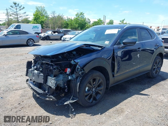 2024 Mazda CX-30 S Select Sport with VIN 3MVDMBBM2RM657781, listed as a IAAI auction lot 42297311 with 13,677 mi miles and . Bid and sale history available at DreamBid. Image 17.