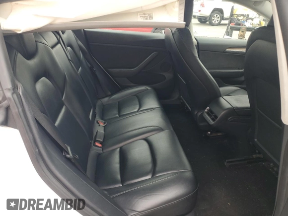 2023 Tesla Model 3 z VIN 5YJ3E1EA1PF561521, wystawiony jako Copart lot #55637855 z przebiegiem 83 008 mil mil oraz Szkoda całkowita • Salvage title. Historia ofert i sprzedaży dostępna na DreamBid. Obrazek 10.
