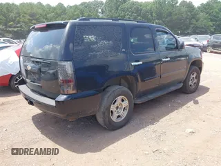 2008 Chevrolet Tahoe LS with VIN 1GNFC13C58R105676, listed as a IAAI auction lot 42603839 with 322,614 mi miles and . Bid and sale history available at DreamBid. Image 4.