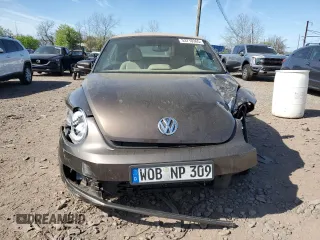 2014 Volkswagen Beetle 2.0L TDI с VIN 3VW6L7ATXEM809087, выставлен на аукционе Copart как лот 53710365 с пробегом Не указан миль и Списание • Salvage title. История ставок и продаж доступна на DreamBid. Изображение 5.